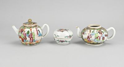 a group of three chinese porcelain teapots and covers