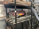 an image of a room with a ladder and a pile of wood