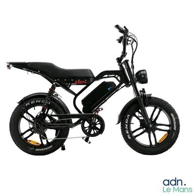 an image of a black motorcycle with a black seat and yellow rims