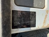 a close up of a sign on the side of a truck