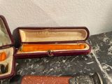 two different types of tools in a case on a table