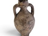 an old vase that is sitting on a white surface