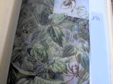 une photo d'un livre sur lequel figure l'image d'une araignée