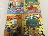 quelques livres posés sur un lit