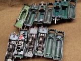 many pieces of green plastic that are laying on the ground