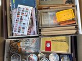 a cardboard box filled with assorted items in it