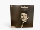 a black and white photo of a woman ' s face with the words barbara on it