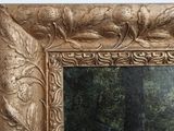 a picture of a mirror that is hanging on a wall