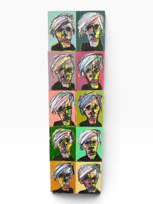 a close up of a skateboard with many different pictures of a man
