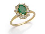 an emerald and diamond cluster ring