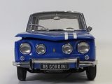 a blue car with a white stripe on the front of it