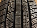 a close up view of a tire on a wooden surface
