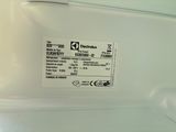 an image of a close up of a label on a refrigerator