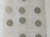a lot of coins that are on the table