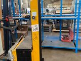 a picture of a fork lift in a warehouse