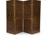 an old wooden folding screen with a decorative design
