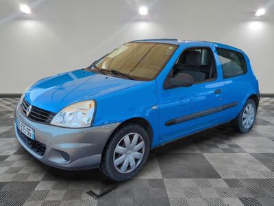 a picture of a blue car parked in a garage