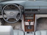 a dashboard of a car with a steering wheel and a dash board