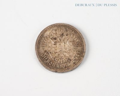 an image of a coin on a white surface
