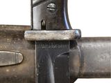 a close up of a knife on a metal pole