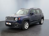 the blue jeep is parked in a room with a black floor