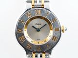 une montre-bracelet en argent et en or, ornée de chiffres romains