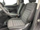 the interior of a car with black leather seats and a steering wheel