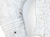 a white object that is shaped like a fish