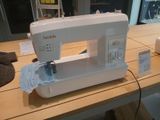 a sewing machine sitting on a table in a room