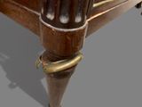 a close up view of a bed with a wooden frame