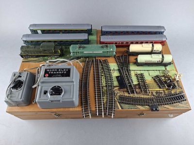 a lot of toy trains on display on a table