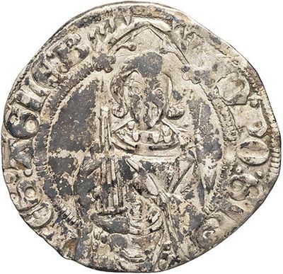 a silver coin with an image of a man on it