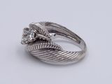 an image of a diamond ring on a white background