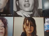 many pictures of a woman that are on a table