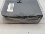 a box of food wrapped in plastic on a table