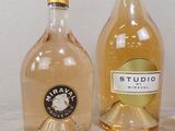 three bottles of wine sitting next to each other on a table