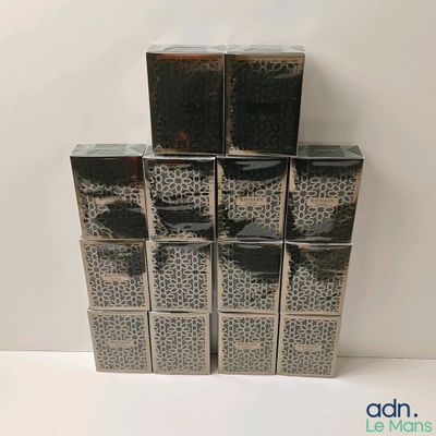 a stack of four boxes that are stacked on top of each other