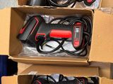 two boxes with two different types of electrical tools in them