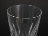 close up of a glass of water on a black background