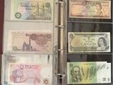cinq billets de banque canadiens différents dans un classeur
