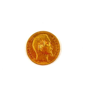 l'image d'une pièce d'or sur laquelle figure le visage d'une femme