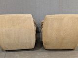 pair of mid - century style swivel chairs in beige velvet