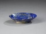 bowl with a blue glaze decoration on the outside of the bowl