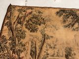a picture of a tapestry on the floor of a room