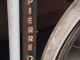 a close up of a bike with a sign on it