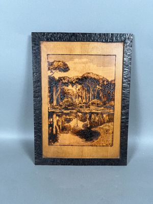 an image of a picture of a picture of a lake in the woods
