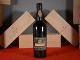 a bottle of wine that is sitting on a table