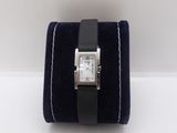 a watch that is sitting on top of a velvet case