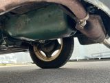 a close up view of the exhaust pipe of a car