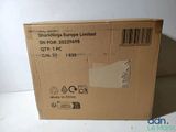 a box with a sticker on it sitting on a table